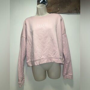 Aeropostale cropped light pink sweater shirt
Size L